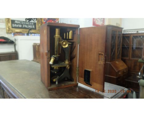 A boxed microscope by Bakers of High Holborn