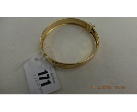 An 18ct gold bangle bracelet, weight 19 grams