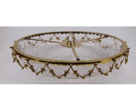 A cut glass ceiling light fitting, of domed circular form, the brass frame decorated with floral swags, dia.42cm