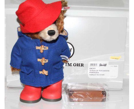 A Steiff model of Paddington Bear No. 228 in chestnut mohair with suitcase, boxed with certificatesIn very good original cond