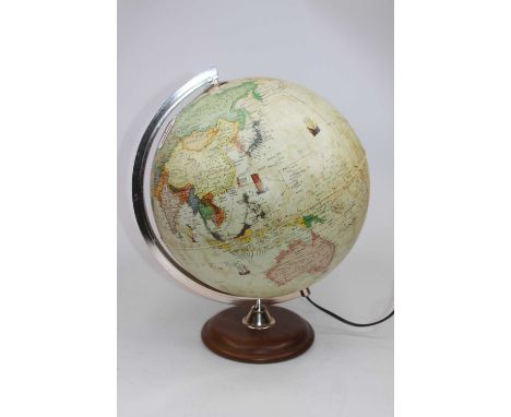 A contemporary table lamp in the form of a terrestrial globe, height 38cm