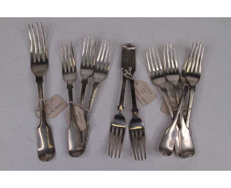 A Victorian silver table fork, in the Fiddle pattern, having monogrammed terminal, maker Edward Ramsey, Exeter 1855; together