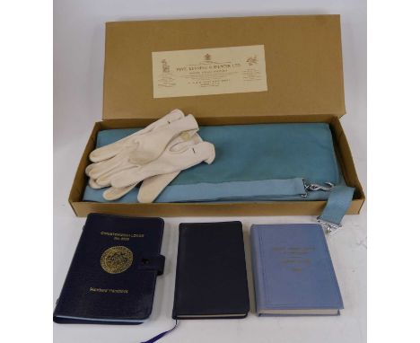 A collection of masonic items to include a sash, white cotton gloves, Christchurch Lodge No. 6829 Members' Handbook, United G