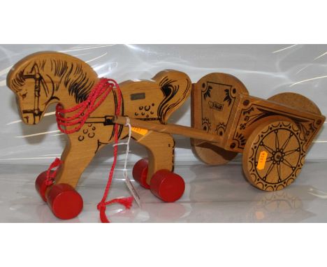 A Steiff beech and pine model of a horse and cart, with painted detail on red wheels with brass plaque, length 45cm