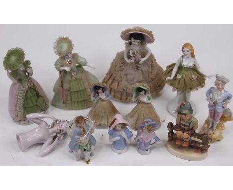 A group of Japanese porcelain figures of ladies, together with Goebel and other ceramic figures