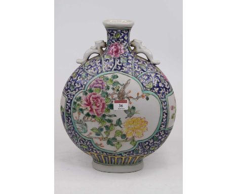 A Chinese export moon flask enamel decorated with birds and flowers within a further famille rose border, height 36cmIn good 