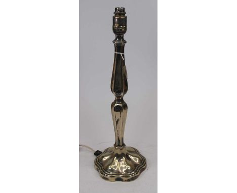 A silver plated table lamp, of double-ended fluted form and on a shaped hexagonal weighted base, h.49cm (including fittings)