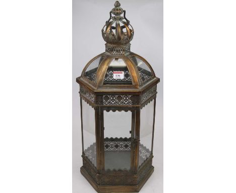 A modern metal framed and glazed dome topped hanging lantern, of hexagonal form, h.62cm