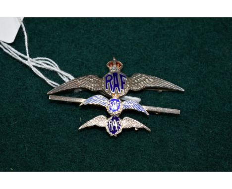 A silver and enamel RAF sweetheart brooch; together with two similar examples, largest 57mm, (3). 