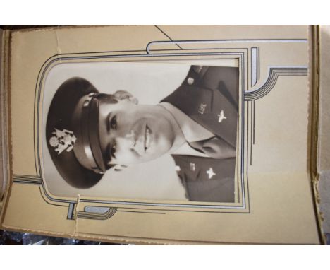 A World War II US Air Force Major's jacket and belt,&nbsp;with various badges and nine medal ribbons; with cap bearing inscri