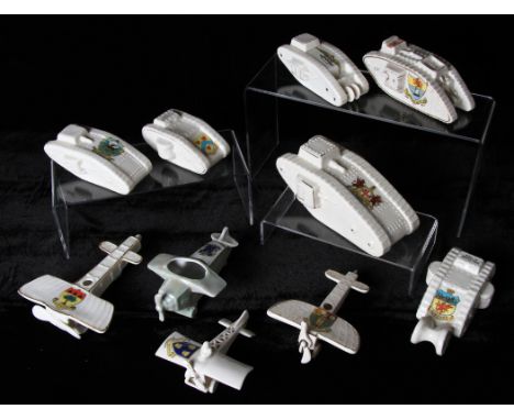A group of WW1 Crested Ware tank and aeroplane models to include; large tank with City of London crest by Botolph China (A/F)