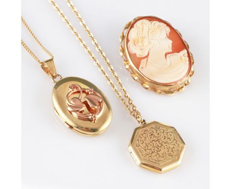 A 9ct Clogau yellow gold locket, of oval form having applied rose gold foliage decoration, hallmarked Sheffield 2000, on a 9c