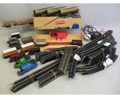 Hornby '00' gauge - pack away plastic station incorporating control unit, three Thomas the Tank Engine locomotives and anothe