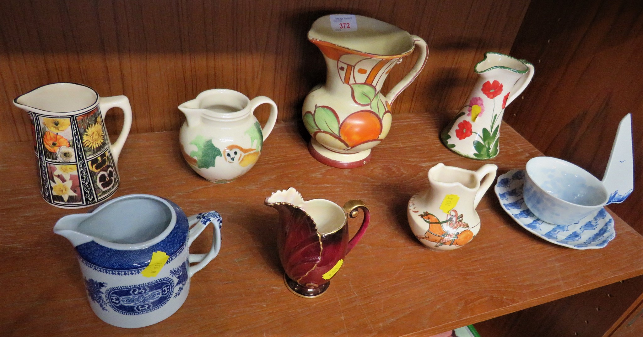 SEVEN CERAMIC VASES INCLUDING WADEHEATH, YORKSHIRE MOORLANDS POTTERY