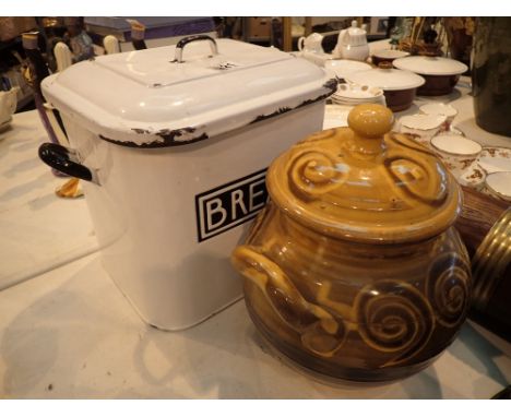 Enamel bread bin and a large lidded pot filled with scallop shells