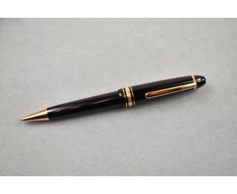 A Montblanc rollerball pen. The Montblanc Meisterstuck rollerball in black with rose gold trim. Number MBMD4V8Q1 boxed with l