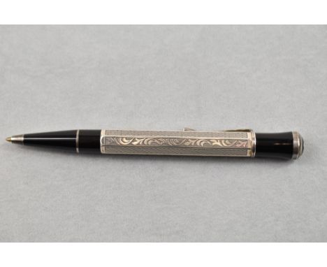 A Montblanc ballpoint pen. A Writers edition Marcel Proust ballpoint pen. hexagonal sterling silver barrel is delicately engr