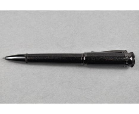 An Alfred Dunhill limited edition ballpoint pen. In black with glitter effect. Number 311/888. Boxed with certificate. CONDIT