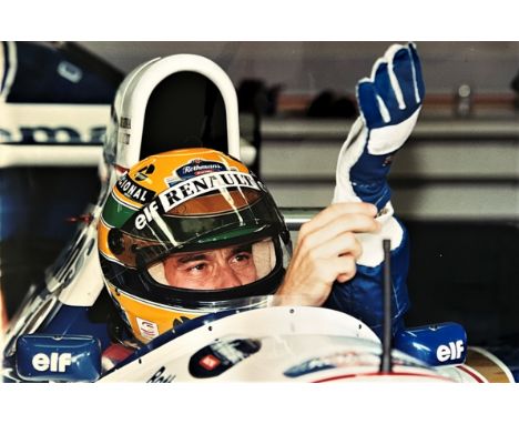 TWO FINE PRINTS OF AYRTON SENNAThe first, a highly evocative colour print of Senna in the driver's seat shortly before the st