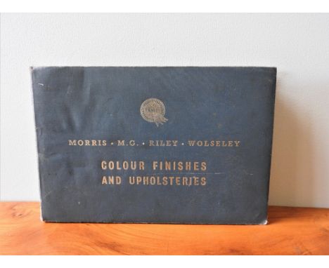 MORRIS MG RILEY AND WOLSELEY COLOUR FINISHES AND UPHOLSTERIES  Measures 375 mm by 250 mm, 60mm deep. A rare period item conta