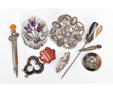 A SELECTION OF SCOTTISH JEWELLERY, to include a silver thistle brooch set with three circular cut purple paste stones, hallma