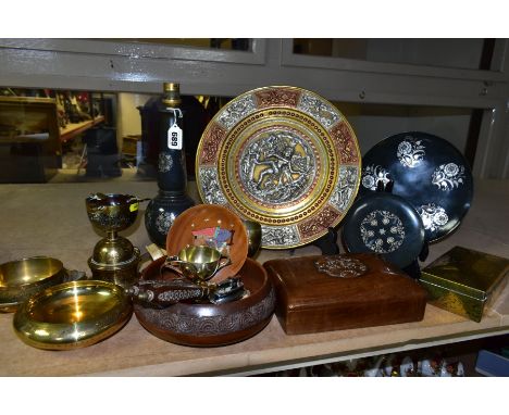 A COLLECTION OF INDIAN AND MIDDLE EASTERN METALWARE AND TREEN, ETC,  comprising a brass charger overlaid  in relief with embo