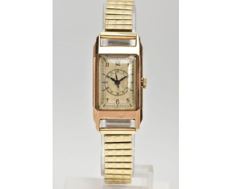 A 9CT GOLD WRISTWATCH, hand wound movement, gold rectangular dial, Arabic numerals, central seconds subsidiary dial to the ce
