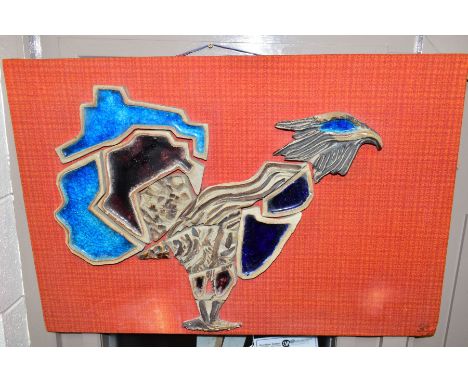 A 1970'S CERAMIC AND ENAMEL GLASS WALL HANGING, said to be depicting a Capercaillie bird, initialled GS bottom right, approxi