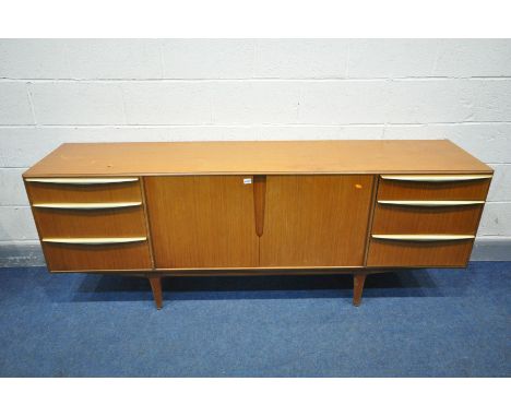 MCINTOSH AND CO TEAK SIDEBOARD, the two banks of three graduated drawers with brass handles flanking double cupboard doors, o