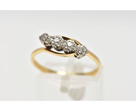 A YELLOW METAL FOUR STONE DIAMOND RING, designed with four illusion set single cut diamonds, crossover shoulders, to a plain 