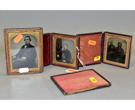 THREE VICTORIAN AMBROTYPES, all three in leather and velvet cases, the largest with split hinge, comprising three quarter len