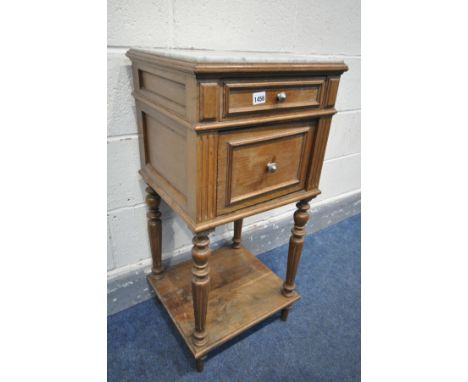 A 19TH CENTURTY FRENCH OAK POT CUPBOARD, with a marble insert, single drawer and a single door enclosing an enamel interior, 