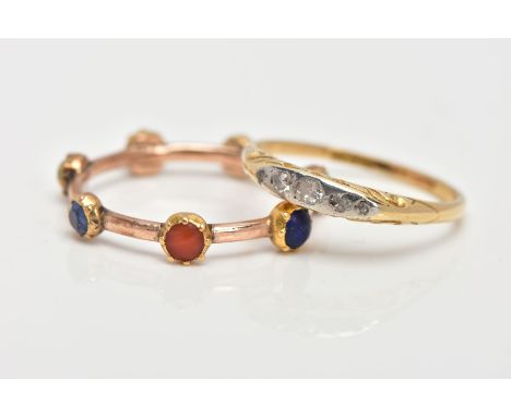 TWO YELLOW METAL GEM SET RINGS, one yellow metal ring set with five rose cut diamonds, in a raised mount with scrolling detai