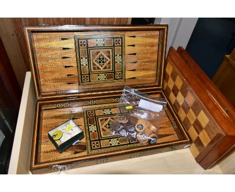 A MARQUETRY AND MOTHER OF PEARL INLAID BACKGAMMON AND CHESS BOARD WITH OTHER GAMES, comprising a hinged games board, the exte