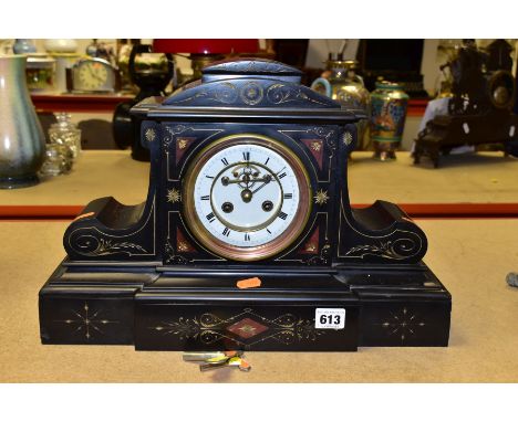 A VICTORIAN SLATE MANTLE CLOCK WITH OPEN ESCAPEMENT TO THE DIAL, Roman numerals to the enamel chapter ring, runs and chimes w