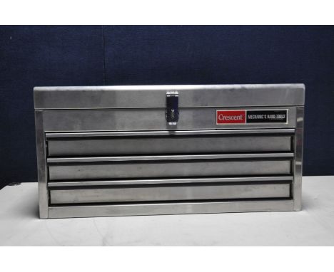 A METAL TOP TOOLBOX containing tools to include a number of socket sets, spanners, screwdrivers, ratchets etc