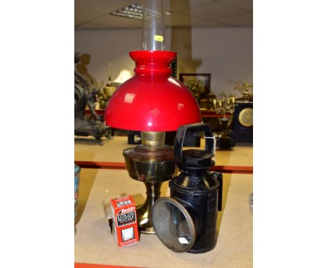 A RAILWAY SIGNAL LAMP AND AN OIL LAMP, comprising a three aspect hand lamp complete with intact glass coloured lenses, burner