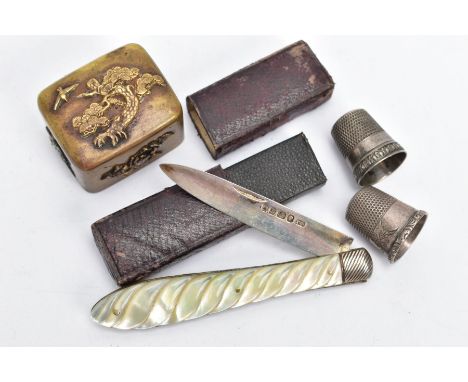 A SILVER FRUIT KNIFE AND OTHER ITEMS, a silver fruit knife with a carved mother of pearl handle, hallmarked silver Sheffield 