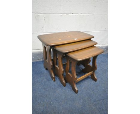 AN ERCOL ELM NEST OF THREE TABLES, largest table width 57cm x depth 35cm x height 43cm