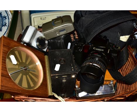 A CASED IMPERIAL SAFARI TYPEWRITER WITH A BASKET OF CAMERAS, CLOCK AND SUNDRY ITEMS, to include a Canon EOS 100 35mm SLR came