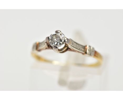 A YELLOW METAL SINGLE STONE DIAMOND RING, centring on a four claw set, old cut diamond, estimated diamond weight 0.20cts, rai