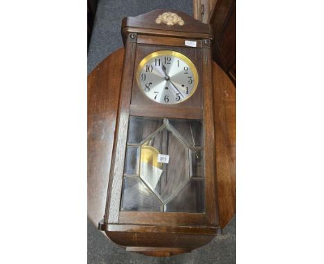 OAK CASED WALL CLOCK WITH PENDULUM 