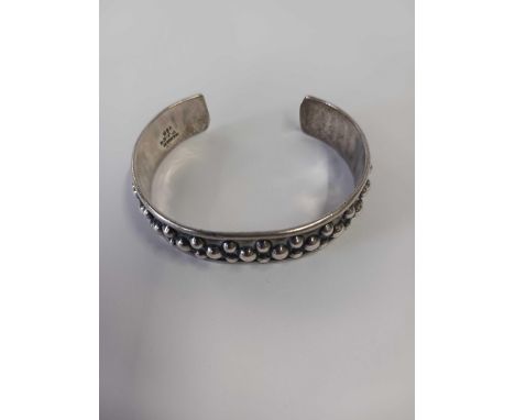 A SILVER BANGLE