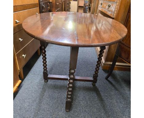 MAHOGANY BOBBIN TURNED OVAL FOLD AWAY TABLE