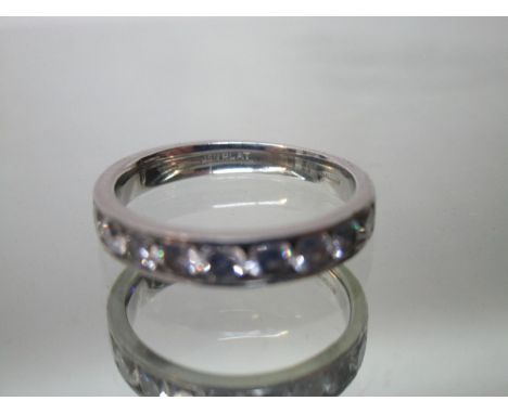 A platinum half eternity ring set with twelve brilliant cut diamonds, approximately 1.5ct in total, size K/L, 7.7g 