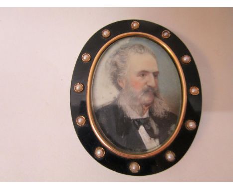 A brooch/pendant, 19th century German School - a head and shoulder portrait miniature of a bearded gentleman, 2" x 1 1/2" in 