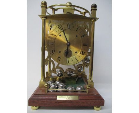 A 20th century spherical rolling ball table clock, manufactured by Harding Bazeley, Cheltenham, England, skeleton movement ha