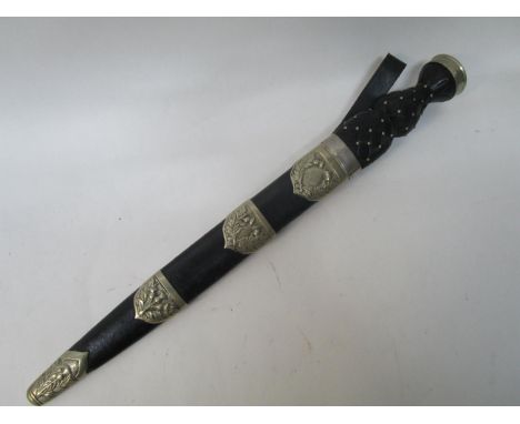 A Scottish dirk, the carved wooden handle with a silver plated cast top, the blade stamped Fenton, 12 x 23, with an arrow abo