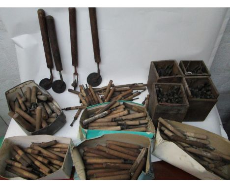 A large collection of leather working tools, comprising of ten part sets of letters and numbers, various sizes from 1/4"h to 