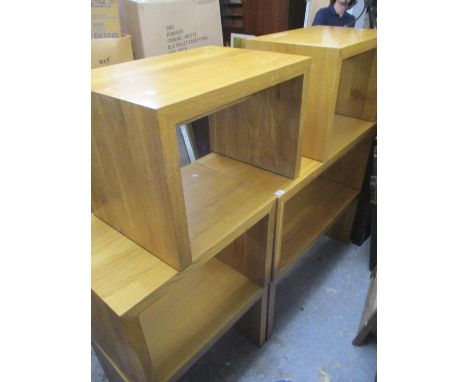 Two light oak coffee tables standing on block shaped legs, 18" h x 39" w, together with three smaller matching tables, 18" h 